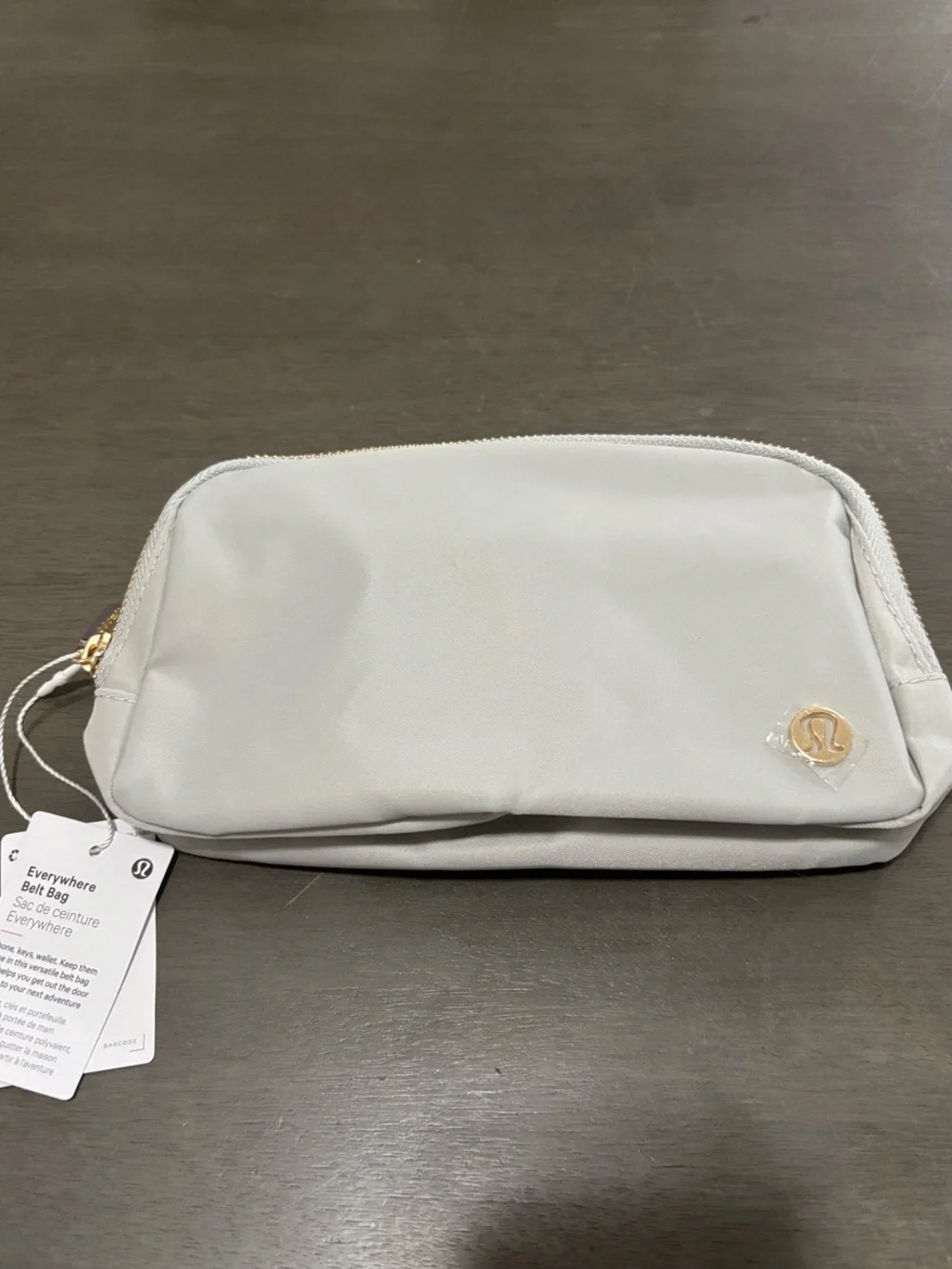 lululemon athletica Light Gray Cosmetic Pouch with Gold Logo